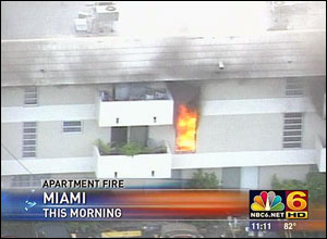 Firefighters were able to rescue two people from a second-story balcony and residents in the building were evacuated.