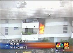 Firefighters were able to rescue two people from a second-story balcony and residents in the building were evacuated. Firefighters were able to rescue two people from a second-story balcony and residents in the building were evacuated.