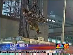 Crews used the crane at the construction site to bring the man down Thursday morning. Crews used the crane at the construction site to bring the man down Thursday morning.