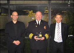 Roseville, MN, Fire Chief Dr. Richard B. Gasaway (center) was presented the 2008 FIRE/W.L. Gore Research Excellence Award by Andrew Lynch (left), Editor of the British FIRE Journal and John Morton (right) from W. L. Gore and Associates. Roseville, MN, Fire Chief Dr. Richard B. Gasaway (center) was presented the 2008 FIRE/W.L. Gore Research Excellence Award by Andrew Lynch (left), Editor of the British FIRE Journal and John Morton (right) from W. L. Gore and Associates.