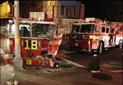 FDNY Squad 18 (left) and Ladder 12 collided at an intersection while responding to the same alarm. FDNY Squad 18 (left) and Ladder 12 collided at an intersection while responding to the same alarm.
