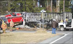 A fiery crash involving a Crisp County Fire and Rescue truck took the life of an Ohio man and left a county firefighter in critical condition Saturday.