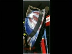 The Newton firefighter is being told that he has to remove the American flag design that is painted on his fire helmet, because the chief says it goes against uniform standards. The Newton firefighter is being told that he has to remove the American flag design that is painted on his fire helmet, because the chief says it goes against uniform standards.