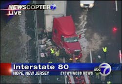Four New Jersey State Police troopers escaped serious injury when a tractor-trailer plowed into their accident scene.