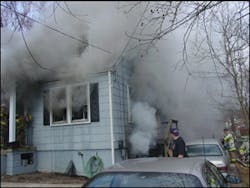 Photo 4 - Though conditions clearly exist on the first floor at this fire, the presence of any smoke from the basement (look at the A-D corner) should attract immediate attention. Photo 4 - Though conditions clearly exist on the first floor at this fire, the presence of any smoke from the basement (look at the A-D corner) should attract immediate attention.
