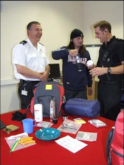 Wiltshire Fire and Rescue Group Manager Steve Williams (left) with Alabare client Ronnie and Police Constable Jim Adams.