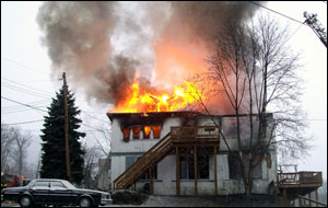 Four people, including two firefighters, are in the hospital and one person is missing after a fire destroyed a historic inn in Fort Loudon.