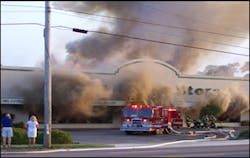 In 2007 and with light smoke showing, Charleston Firefighters implemented a fast and aggressive interior attack into this large enclosed structure involving a furniture store. However, interior conditions gradually deteriorated resulting in prolonged zero visibility. Nine firefighters who were separated from a handline, became disoriented, ran out of air and died.