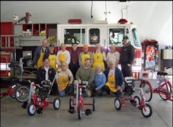 Lady's Island St. Helena Firefighters forge a working relationship with their local chapter of Kiwanis International and The Little Red Dog Foundation to purchase, build, and present special bicycles to special needs children in the Low country of South Carolina. Every time we get together we share a message of safety, be it fire safety, bike safety, auto safety or the like. Lady's Island St. Helena Firefighters forge a working relationship with their local chapter of Kiwanis International and The Little Red Dog Foundation to purchase, build, and present special bicycles to special needs children in the Low country of South Carolina. Every time we get together we share a message of safety, be it fire safety, bike safety, auto safety or the like.