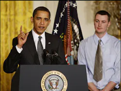 President Barack Obama, accompanied by firefighter Travis Ulerick delivers remarks at the White House Forum on Health Reform.