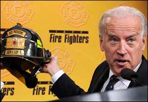 Vice President Joe Biden holds a firefighters helmet that he was presented with after his remarks at the International Association of Fire Fighters 2009 Legislative Conference in Washington on March 16.