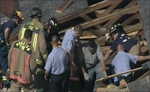 Two men were found alive on the first floor in void spaces.