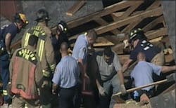 Two men were found alive on the first floor in void spaces. Two men were found alive on the first floor in void spaces.