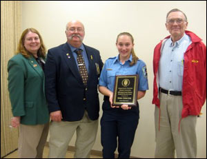 Rush Fire Department President Diana Pfersick, Post Advisor Royer Pfersick, Explorer Jenna Cirincione and Al Sweet - FASNY Youth in the Fire Service Committee and winner of Monroe County Volunteer Firefighter Association's Distinguished Service Firefighter of the Year for 2009.