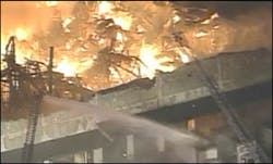 About 100 employees and customers were in the store and warehouse at the time, but everyone was able to get out without injury. About 100 employees and customers were in the store and warehouse at the time, but everyone was able to get out without injury.