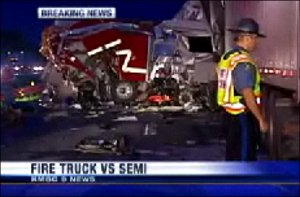 There were no firefighters on the truck at the time of the crash.
