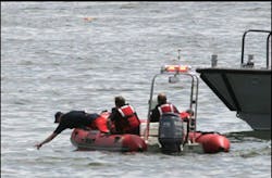 Emergency workers look for debris and possible survivors in the Hudson River following the crash. Emergency workers look for debris and possible survivors in the Hudson River following the crash.