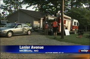 Troopers cited a firefighter after a fire truck went rolling in a Mount Holly home Saturday.