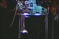 The injured worker was lowered to the ground by Jacksonville Fire-Rescue's Urban Search and Rescue unit using a rescue basket and ropes. The injured worker was lowered to the ground by Jacksonville Fire-Rescue's Urban Search and Rescue unit using a rescue basket and ropes.