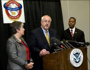 FEMA Administrator Craig Fugate answers questions at a press conference following the swearing in Fire Administrator Kelvin Cochran on Aug. 27 at Fire-Rescue International.
