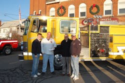 (From left to right)Stillwater Fire Chief Shane Mahar, Boght Assistant Chief Scott St. Denis, Village of Stillwater Mayor Ernest Martin (handing over the check), and Stillwater Assistant Chief Jeff Mahar. (From left to right)Stillwater Fire Chief Shane Mahar, Boght Assistant Chief Scott St. Denis, Village of Stillwater Mayor Ernest Martin (handing over the check), and Stillwater Assistant Chief Jeff Mahar.
