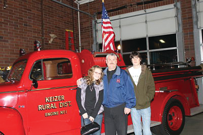 Firefighter of the Year Tim James with his daughter Alyssa and son Tucker