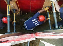 Photo 3: A set of pneumatic struts set in place during a trench operation.