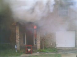 Photo 1: San Antonio firefighters were engulfed by a rapidly spreading, wind-driven wall of fire as wind gusts reached 24 mph. Photo 1: San Antonio firefighters were engulfed by a rapidly spreading, wind-driven wall of fire as wind gusts reached 24 mph.