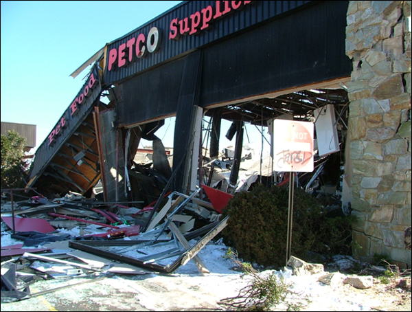 Photo 6: A gas leak in this pet supply store resulted in an explosion that completely destroyed this building.