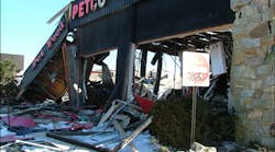 Photo 6: A gas leak in this pet supply store resulted in an explosion that completely destroyed this building.