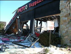 Photo 6: A gas leak in this pet supply store resulted in an explosion that completely destroyed this building.