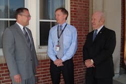 After his lecture, Dr. Don Stewart, center, talks with acting Superintendent of the National Fire Academy, Kirby Kiefer, left, and Glenn Gaines, acting U.S. Fire Administrator.