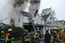 This fire extended from enclosed porch to the second floors of the fire building and an exposure.