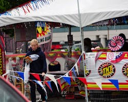 An under-age teen returns with a solo purchase of fireworks from a Hillsboro fireworks stand.