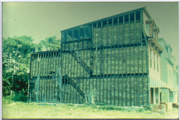 Wood-frame construction using balloon-framing methods.