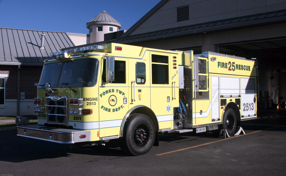Outside the truck bay with a Pierce Arrow Xt PUC Pumper it has a 425 Detroit Diesel Engine. Also a CAFS Foam System with a 1500 GPM 750 water tank.