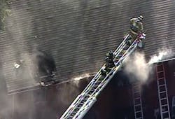 Firefighters battle a two-alarm blaze in a Lorton townhouse that claimed three lives, including two children. Firefighters battle a two-alarm blaze in a Lorton townhouse that claimed three lives, including two children.