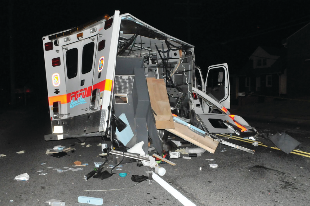 Three men in an SUV were killed early Thursday after their vehicle crashed into an ambulance.
