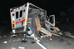 Three men in an SUV were killed early Thursday after their vehicle crashed into an ambulance. Three men in an SUV were killed early Thursday after their vehicle crashed into an ambulance.