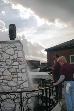 John Price, left, and Dooley Hildebrand cleaned the National Fallen Firefighter Memorial on Wednesday. John Price, left, and Dooley Hildebrand cleaned the National Fallen Firefighter Memorial on Wednesday.