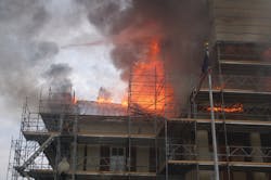 Photo taken about one hour into the fire shows the north side of the courthouse with heavy fire venting from the roof.