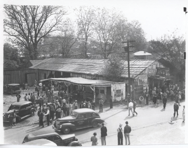 The Rhythm Night Club&rsquo;s exterior the day after the fire. The bodies have been removed and the scene has become a point of interest for curiosity seekers and those hoping to learn the fate of family members and friends.