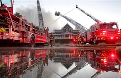 The building fire disrupted traffic on Atlanta's busy Piedmont Road, and smoke was visible to commuters on Interstate Highway 85. The building fire disrupted traffic on Atlanta's busy Piedmont Road, and smoke was visible to commuters on Interstate Highway 85.