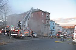 Shortly after arrival light smoke was visible from the lower levels of the home. Shortly after arrival light smoke was visible from the lower levels of the home.