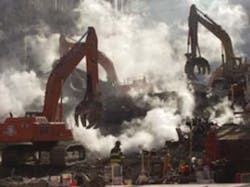 The wreckage of the World Trade Center still smolders as recovery operations continue, nearly a month after the terrorist attack.