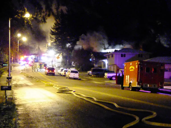 Overall scene, Rescue 99 is on the right. Rescue 99 is a SERT unit staffed by Portland Fire and Rescue EMS personnel to assist at police incidents.