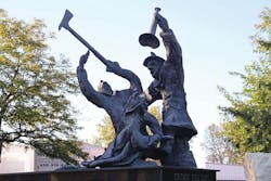 The memorial to the Union Stockyards fire depicts struggling firefighters.