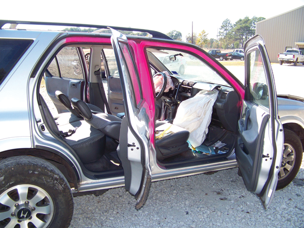 This paint scheme simulates advanced steel utilization in a late-model Chrysler Motors vehicle. The steel is inside the upper A-pillar, through a portion of the roofline, and inside most of the B-pillar.