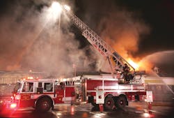 Carmel Ladder 41 works to cut off the fire shortly after arrival in front of the strip mall. Carmel Ladder 41 works to cut off the fire shortly after arrival in front of the strip mall.
