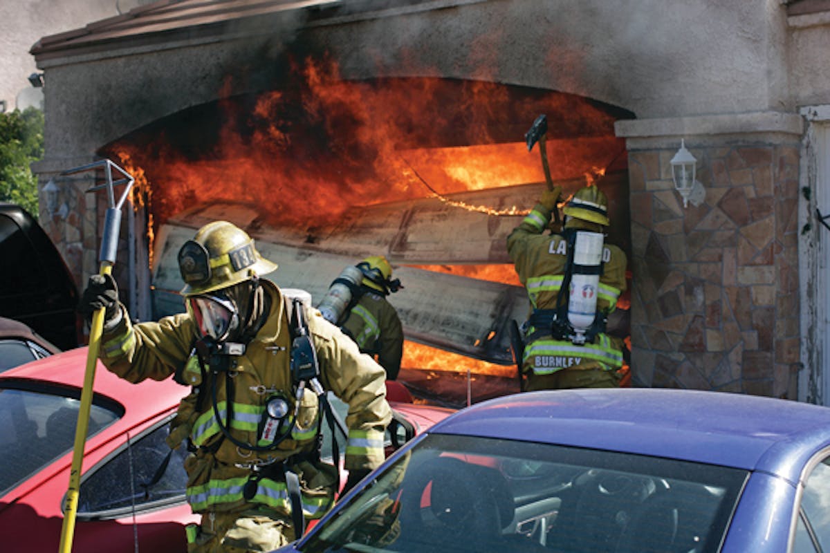 Expect the unexpected when doing truck company work. Los Angeles County, CA, firefighters attacked a fire in a garage under a two-story single-family dwelling, only to find that the home was overcrowded with occupants and the garage had been converted into a living space.